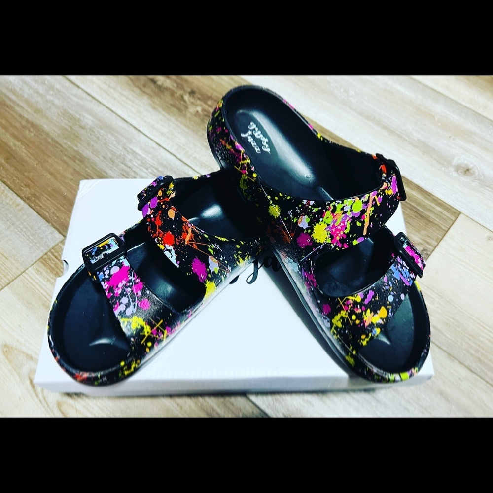 Mama Mia back with paint splatter sandals
